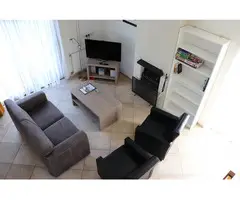 Comfortabel vrijstaand vakantiehuis met zonnig terras en buitenhaard