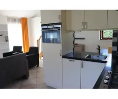 Comfortabel vrijstaand vakantiehuis met zonnig terras en buitenhaard