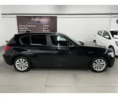 BMW 1-serie 116i Upgrade Edition LEDER / NAVIGATIE / XENON