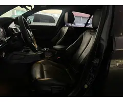 BMW 1-serie M140i xDrive Executive Harman Kardon|Vol leder