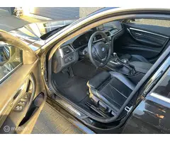 BMW 3-serie 320i High Executive - 7