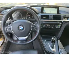 BMW 3-serie 320i High Executive - 9